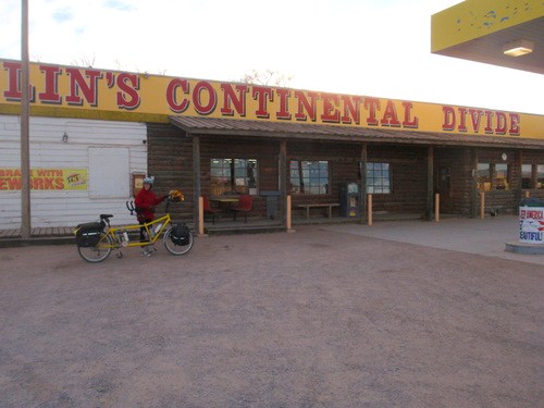 Terry, holding the 'Bee' in front of the Continental Divide Trading Post.